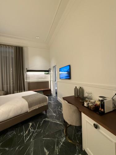 Ένα ή περισσότερα κρεβάτια σε δωμάτιο στο Lovely Rooms