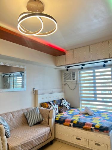 Giường trong phòng chung tại Avida Towers Riala Tower inside IT Park Cebu City