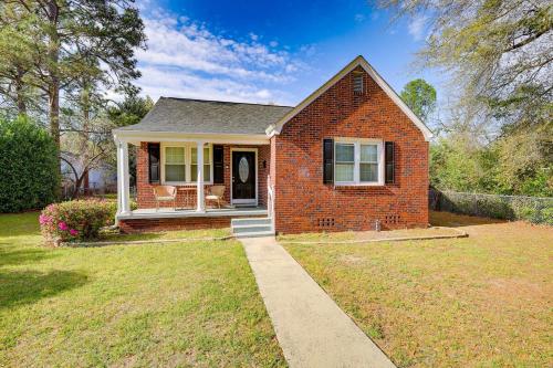 a small brick house with a grass yard at 2 Bed Charming Home Cayce W Columbia in Cayce