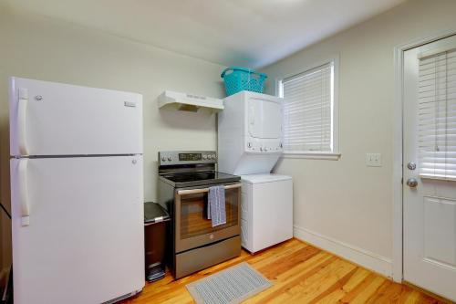 a kitchen with a refrigerator and a stove at 2 Bed Charming Home Cayce W Columbia in Cayce