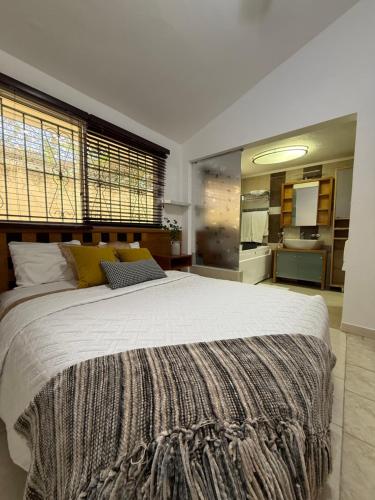 Katil atau katil-katil dalam bilik di Villas Jazmin