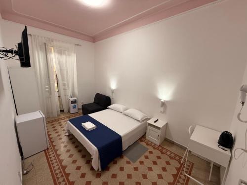 a bedroom with a bed and a television in it at BeLLa Vista in Rome