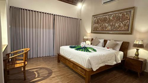 Voodi või voodid majutusasutuse Teluk Menjangan Bali toas