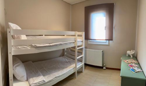Una cama o camas en una habitación de Serenity Residence