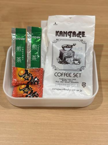 a package of coffee set in a container on a table at The Noborisaka Village -登り坂ビレッジ- in Fujikawaguchiko