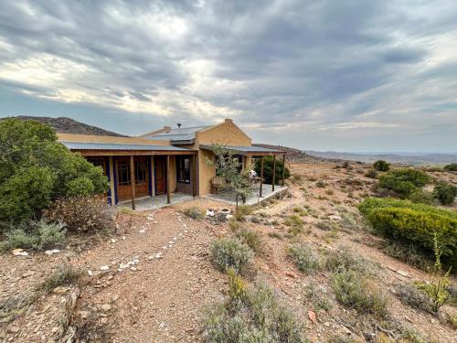 a house in the middle of the desert at Bobbejaankrans, Touwsberg Game and Nature Reserve in Plathuis