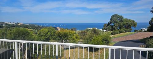 a view of the ocean from a balcony at Seaside Serenity in Mount Martha