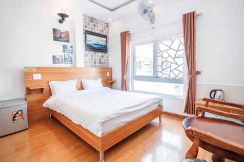 Postel nebo postele na pokoji v ubytování Thanh Anh 2 Hotel - Gần Chợ Đêm Đà Lạt