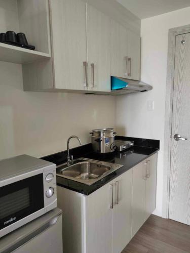 Кухня или мини-кухня в Casa Relajante at Recto Manila
