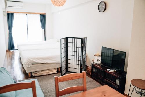 TV a/nebo společenská místnost v ubytování Tipy records inn room