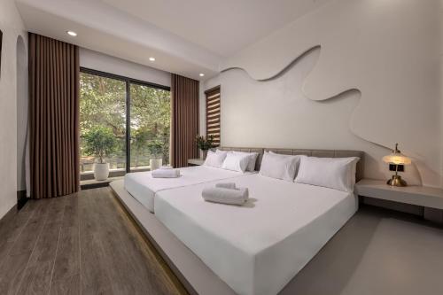 Katil atau katil-katil dalam bilik di Field Hotel & Villa Tam coc