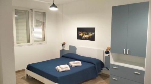 Ένα ή περισσότερα κρεβάτια σε δωμάτιο στο Diana Apartment