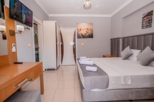 Katil atau katil-katil dalam bilik di Infinity Hotel