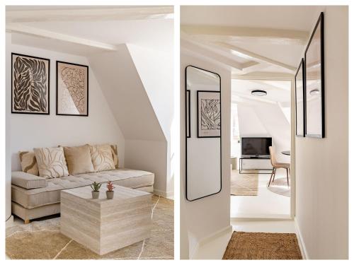 a living room with a couch and a mirror at Sanders Admiral - Cosy 1-Bdr Apt in Copenhagen