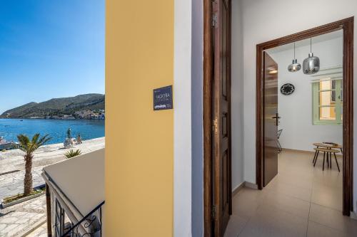 a hallway with a view of the ocean at Agkyra Studio in Symi
