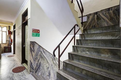 a staircase in a house with a stair case at Hotel Nancy Dx Near New Delhi Railway Station in New Delhi