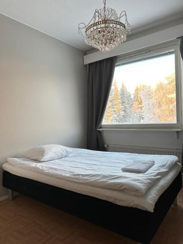 Un pat sau paturi într-o cameră la Lumi Room