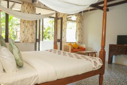 Letto o letti in una camera di De Soul Sante Beach Resort Morjim Goa