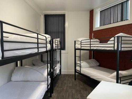Postel nebo postele na pokoji v ubytování Rahman Hostel