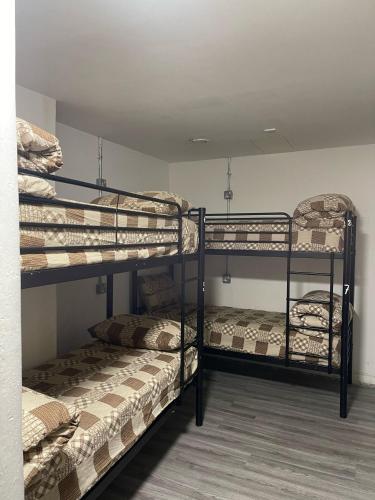 Postel nebo postele na pokoji v ubytování Rahman Hostel