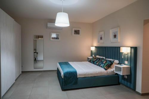 Postel nebo postele na pokoji v ubytování B&B Guida