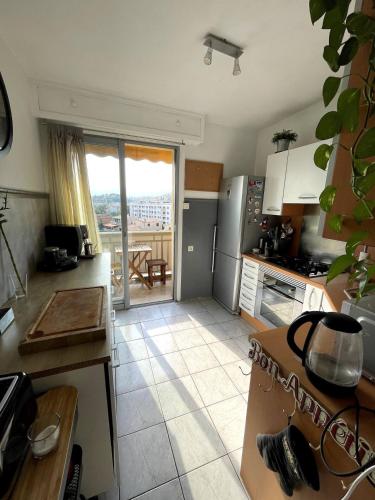 Kuchyň nebo kuchyňský kout v ubytování Appartement de Tim