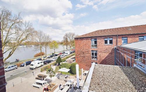 an aerial view of a building and a parking lot at Jugendgästehaus Aasee in Münster