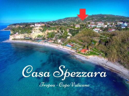 an aerial view of a beach with a red arrow at Casa Spezzara (tra Tropea e Capo Vaticano) in Santa Domenica