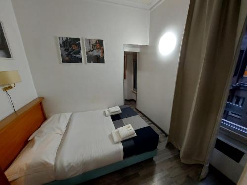 Postel nebo postele na pokoji v ubytování Hotel Positano 2