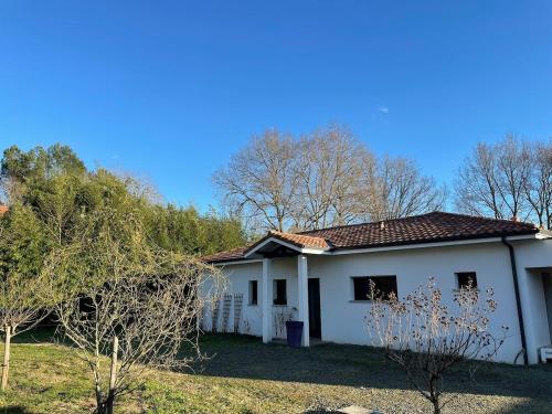 Photo de la galerie de l'établissement Maison familiale avec jardin sur la côte landaise, à Magescq