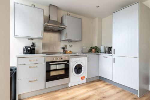 Η κουζίνα ή μικρή κουζίνα στο Luxury Apartment New Street Birmingham