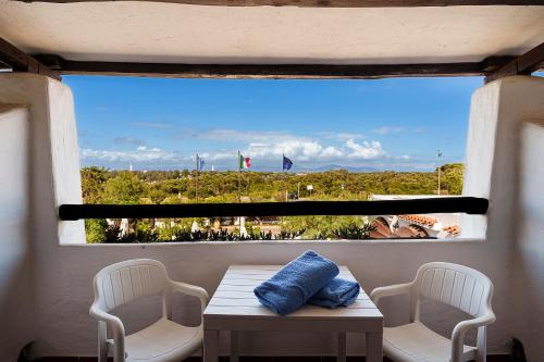 Un lugar para sentarse en Hotel Le Dune