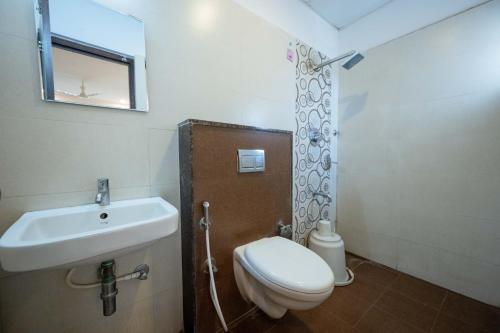 Koupelna v ubytování REGALIA INN &SUITES