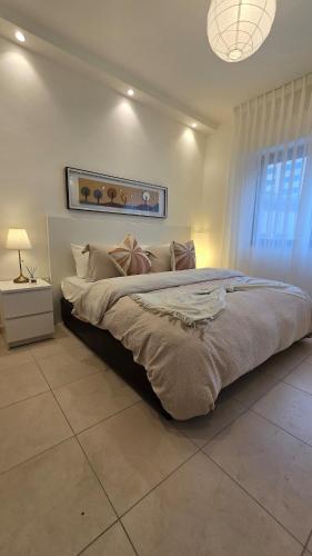 Modern One Bedroom with Steps from the Best Shops