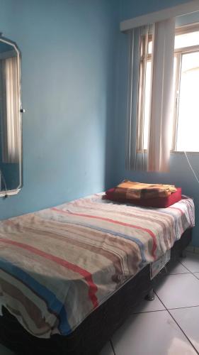 Ένα ή περισσότερα κρεβάτια σε δωμάτιο στο Apartamento