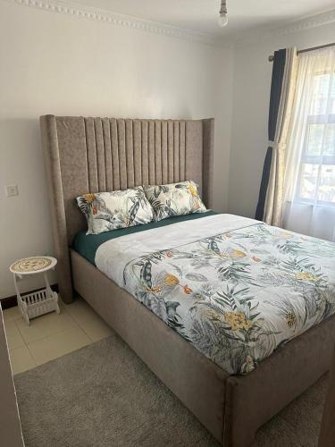 Ένα ή περισσότερα κρεβάτια σε δωμάτιο στο Stylish Apartment Ideal for long Stays