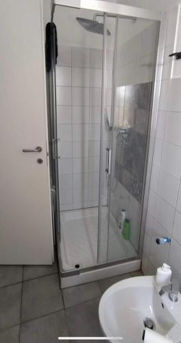 a bathroom with a shower and a sink at Case Vacanze - da Francesco in Policoro