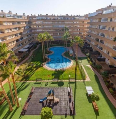 Ático junto al Auditorio con Terraza Privada y Parking