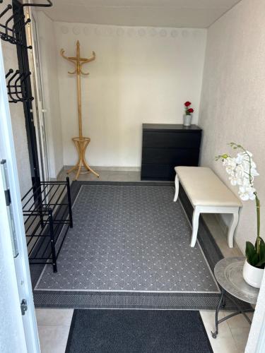 a living room with a cross on the wall at Apartment Weiherwiese in Zweibrücken