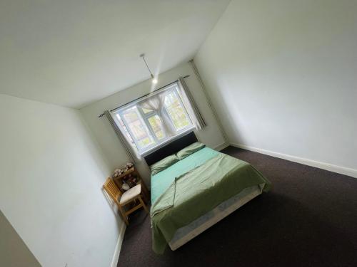 Postel nebo postele na pokoji v ubytování Ilford rooms