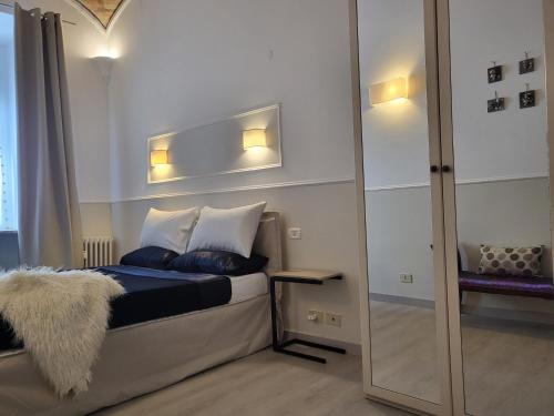 A bed or beds in a room at Monteoppio one