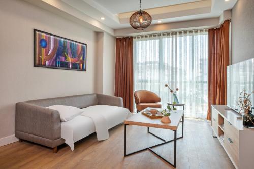 TV a/nebo společenská místnost v ubytování Sirius Town Residence and Spa