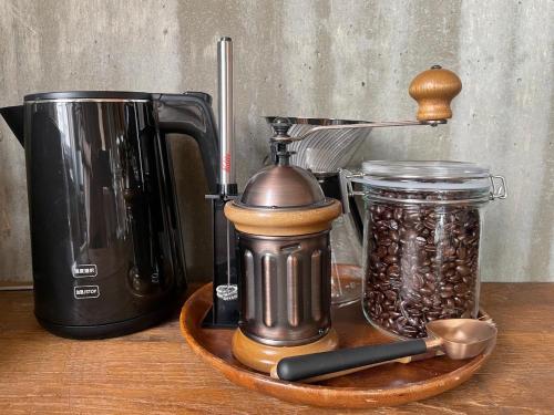 a counter with a coffee maker and a jar of beans at "NICE!" Ocean view of Ishigaki island, Okinawa/ Four-bedroom Villa in Ishigaki Island