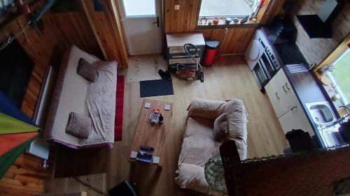 an overhead view of a living room with a couch at "The Den" Belmullet in Belmullet