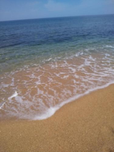 a view of the ocean from the beach at taiza play in Kyotango