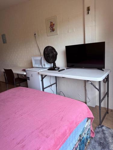 TV a/nebo společenská místnost v ubytování Studio 2 Asa sul - 305