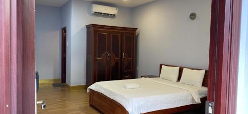 Postel nebo postele na pokoji v ubytování BUNGALOW HOTEL
