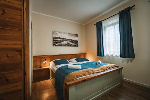 Postel nebo postele na pokoji v ubytování Guest House EJGA