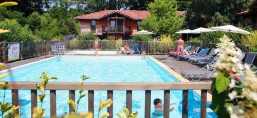 Photo de la galerie de l'établissement Duplex avec piscine proche océan, à Messanges