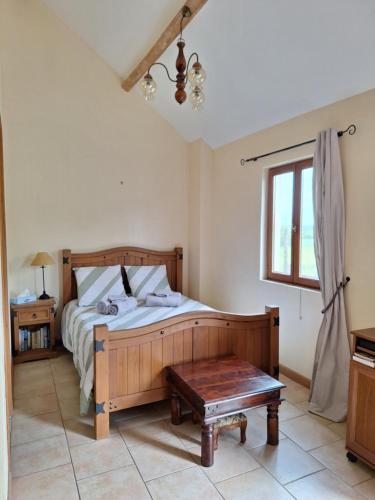 Cama o camas de una habitación en Le Chemin des Hêtres